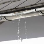 Gemini Generated Image extadrextadrexta Gutter Leak Damage Gutter Protection,exterior home water control,rainwater drainage management The Cost Impact of Ignoring Small Gutter Leak Damage Early